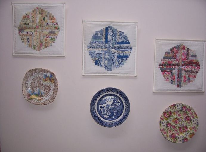 Three mini quilts of plates