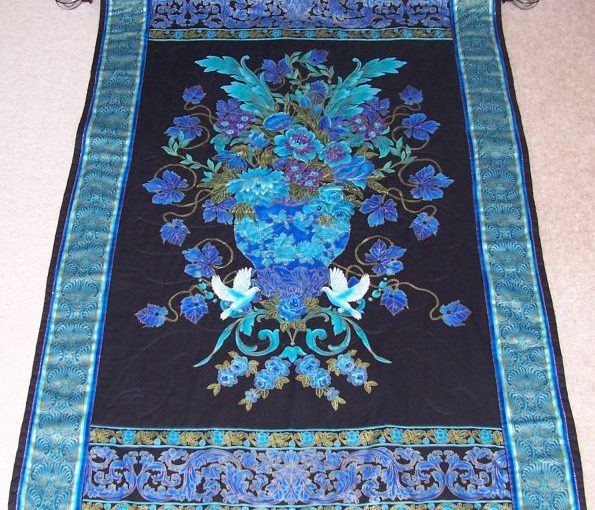 Flowers, doves and urn wall hanging